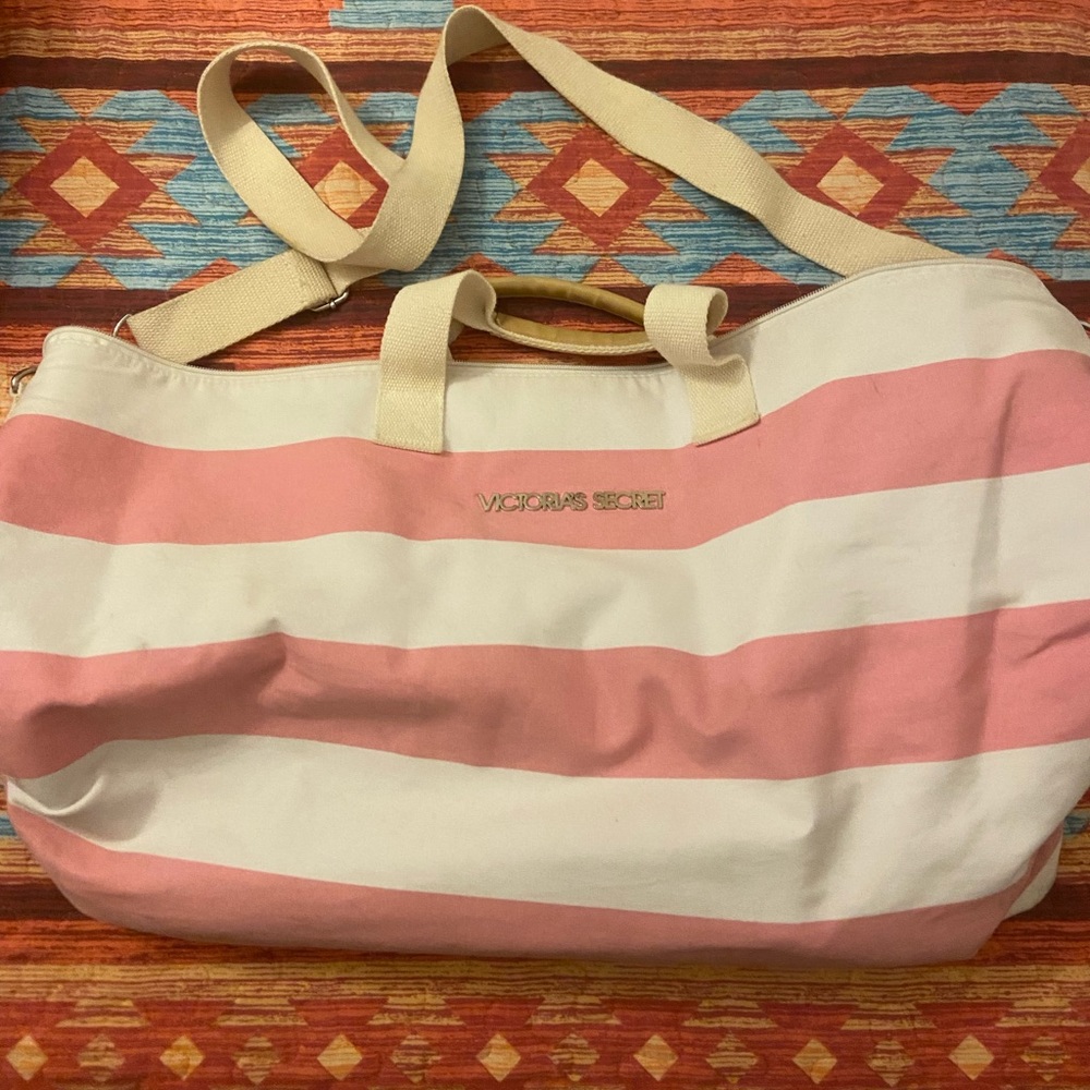 Victoria’s Secret pink and white strip duffel bag